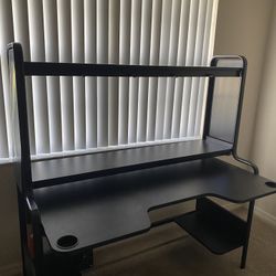 Desk with shelves and cup holders 
