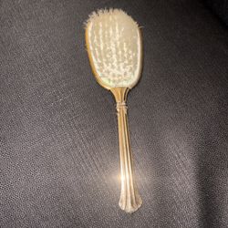 Vintage gold tone, metal hairbrush