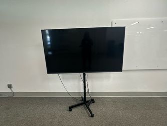 Vizio 70” 4k Smart Tv on rolling stand