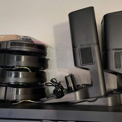 Rumba Vacuum Cleaners 2 with Emptying Dock, 1 Without 