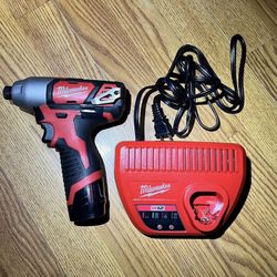 Milwaukee M12 12V Lithium-lon Cordless 1/4 in. Hex Impact With battery and charger