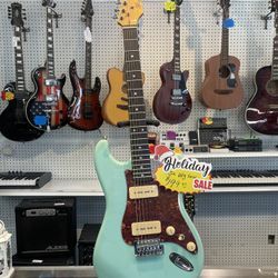 SX VTG Teal 6 String Guitar 