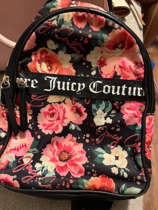 Woman’s juicy couture pink flower backpack used once good condition 15$ pick up in Ontario
