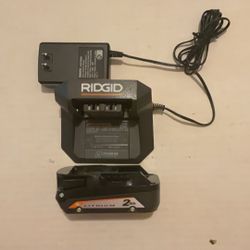 Brand New RIDGID 18 Volts Set Charger and 2.0 AH Battery.       55 Firm on Price.       55 Firme en Precio.