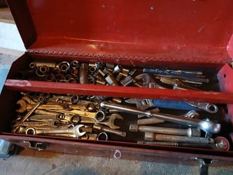 Miscellaneous tools Toolbox two levels of tool wrenches socket wrenches open end wrenches screwdrivers, mallet, hammers levels, and more
