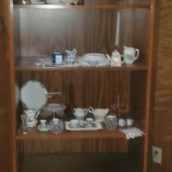 Beautiful wooden display cabinet with shelves, Has Light, perfect for showcasing your favorite collectibles, china, or decorative items