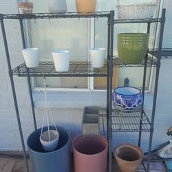 12 Ceramic Planters W/ Pottery Shelving.