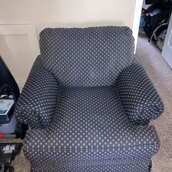 Beautiful Blue Cushioned Chair.