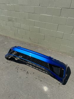 2024 Volkswagen Jetta GLI. Front Bumper cover with lower grill.