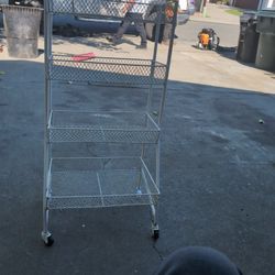 - 4,-tier Rolling Utility Cart With Coaster Wheels 