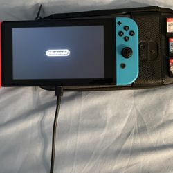 Nintendo Switch + 3 Disk Games 