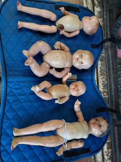 4 very old rough baby dolls