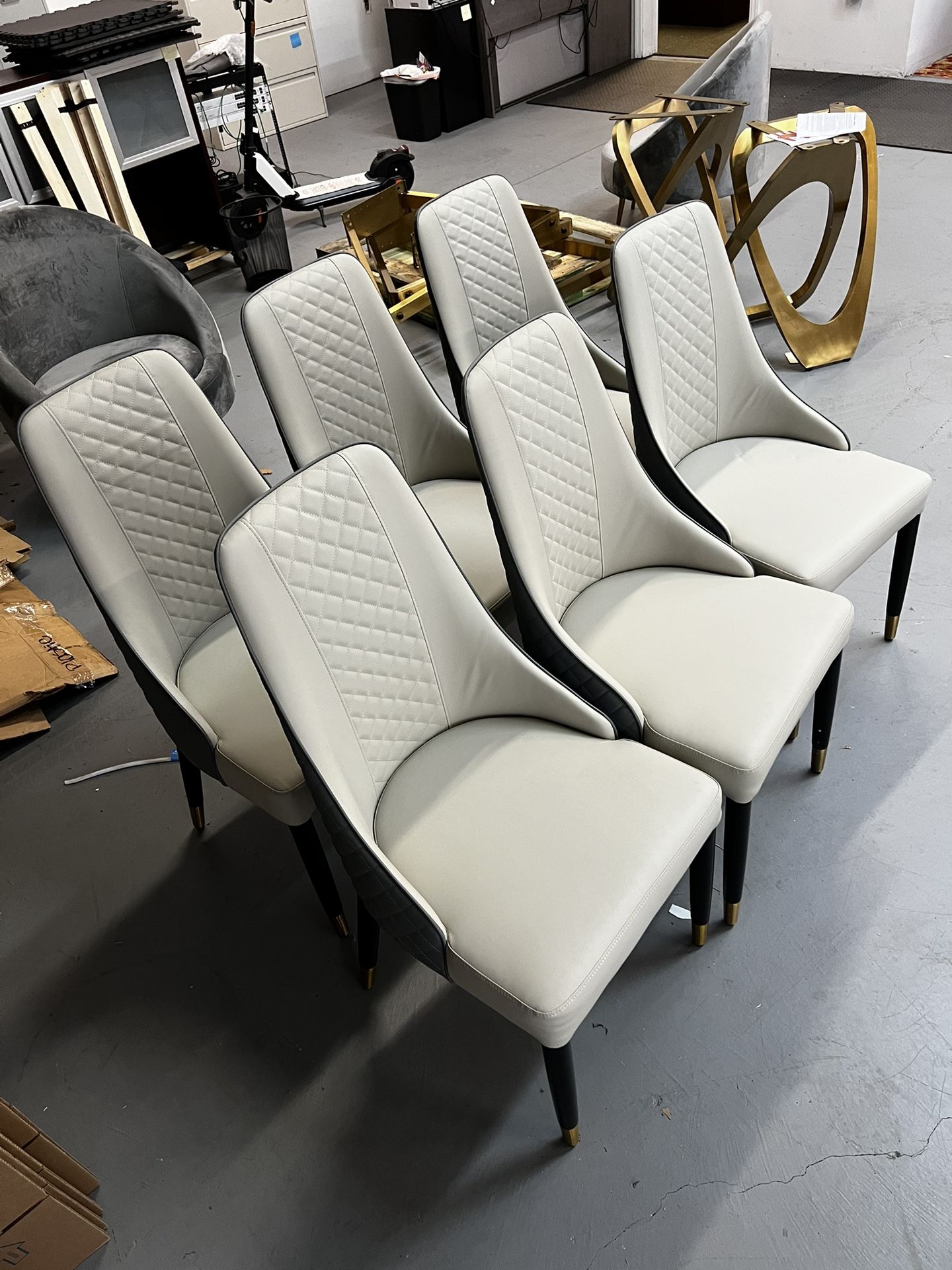 Grey Quilted Leather Dinning Chairs With Gold Accent