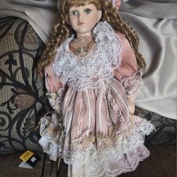 Vintage Porcelain Doll $25