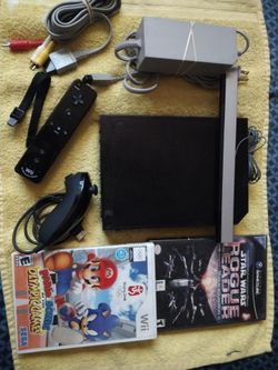 Nintendo Wii plays GameCube games as well works good complete no offers no trade 75th Ave Indian School serious buyers only please