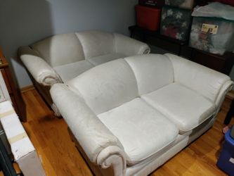 Used 2 Fabric Couches 64" W x 26" H x 35" D $20 Each