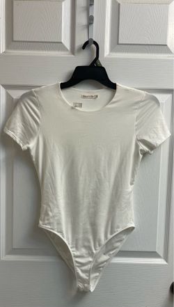 Brand new white short sleeve bodysuit size L Juniors