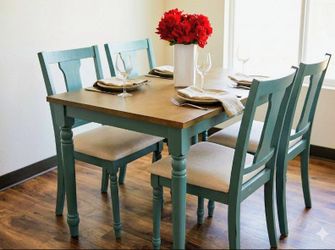 Like new teal and brown table with 4 chairs