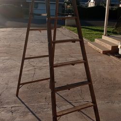 Vintage tall wooden ladder