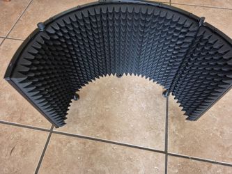 Microphone isolation shield