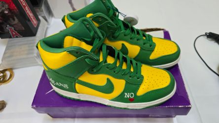 Nike
Supreme x Dunk High SB 'By Any Means - Brazil'