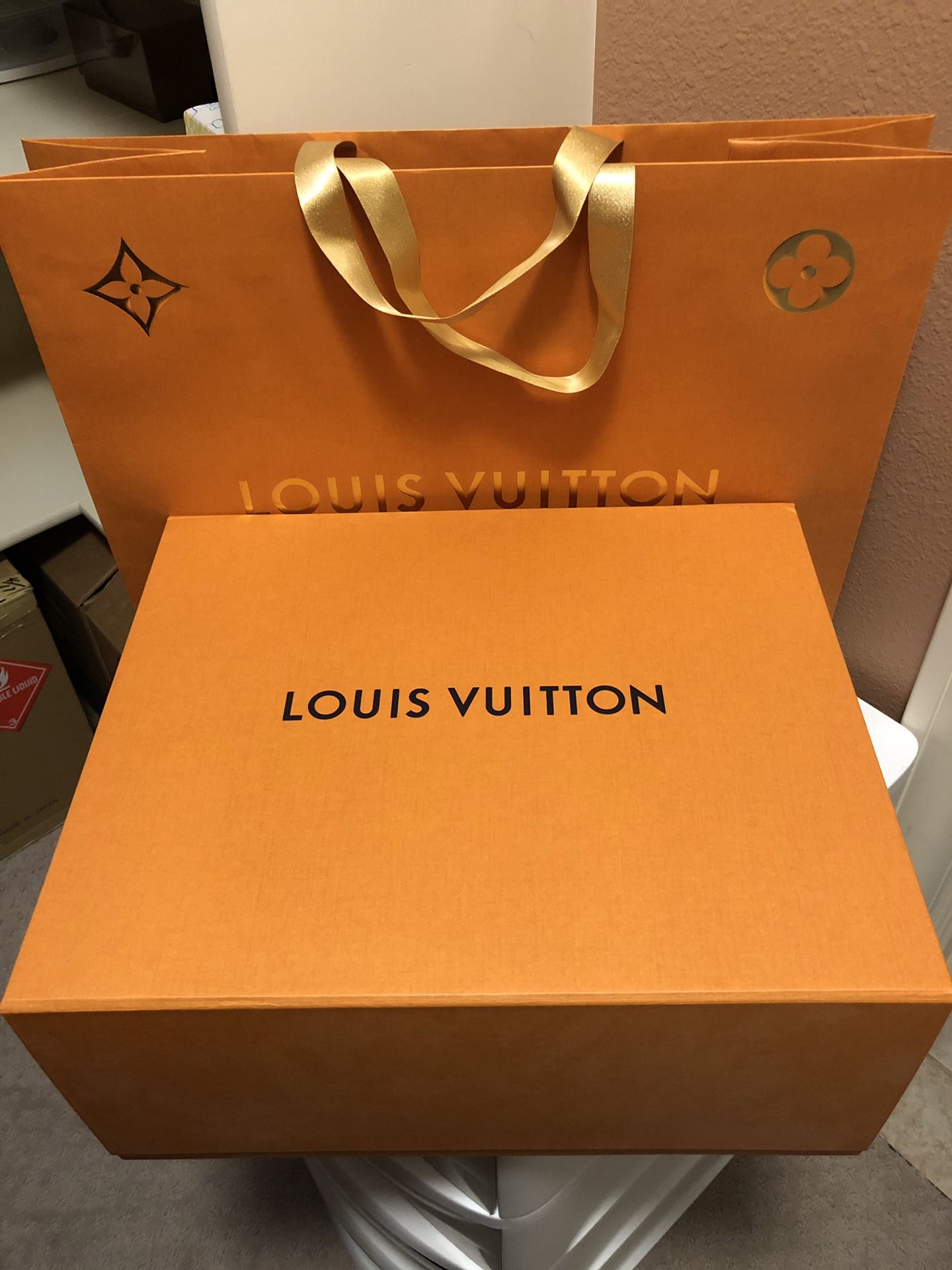 Louis Vuitton box and shopping bag