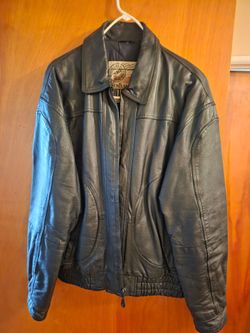 Leather jacket  size (L)..new Zealand  out back