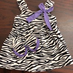 American Girl doll zebra dress with purple bow and sandals  