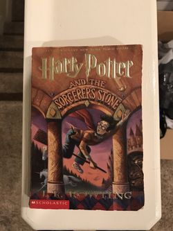 Harry Potter softcover sorcerer’s stone book