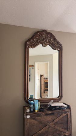 Large wood framed mirror