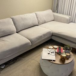 Couch. Living Spaces AQUARIUS II LIGHT GREY SECTIONAL. 120 X 70