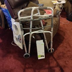 0 A Brand New Walker With A Couple Extra Wheels I'll Take 30 Bucks For It