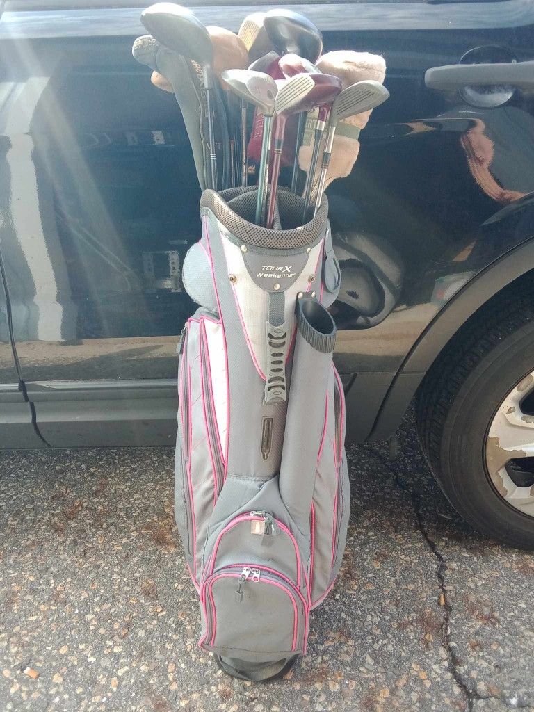 Variety Of Golf Clubs With Bag