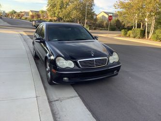 2004 Mercedes Benz four-door sedan Black