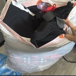 2 BAGS FULL OF CLOTHES
