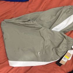 Nike green track pants Size S