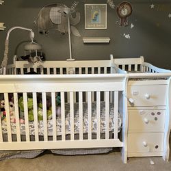 Convertible White Baby Crib with Diaper Changer and Mattress - Versatile and Practical!