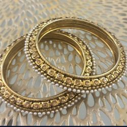 Tradition indian 2 kundan bangles with white pearls all around each bangle size 3.5"