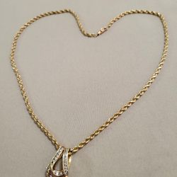 14k Solid Gold Rope Chain And  .50 Carat Diamonds Pendant.  Good Condition 