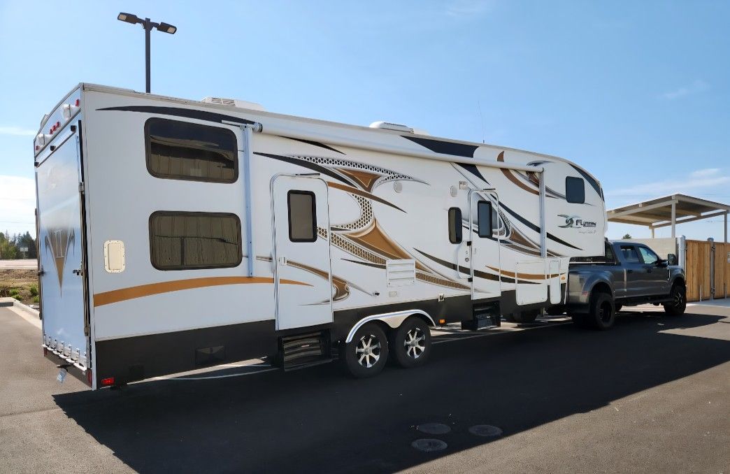 Keystone Fuzion Touring  RV 5th Wheel Toy Hauler Camping Trailer