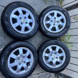 15” Honda Accord wheels  and tires 4x114.3 tires  195/65r15 continental /95% life tread wear 