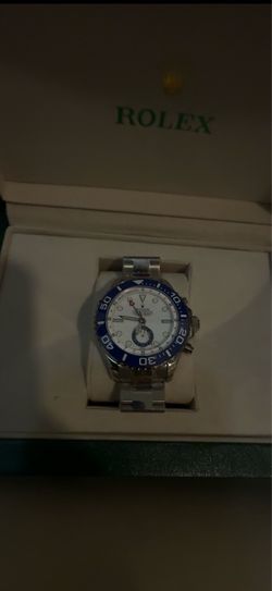 Rolex Watch with Blue Bezel