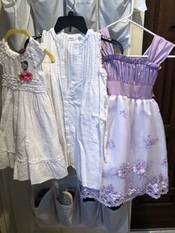 Dresses size 3/4 $ 7 each and purple $15