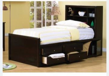 Twin bed with bookcase and drawers built in