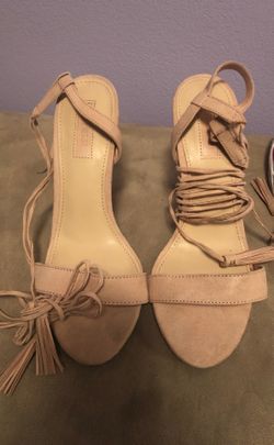 Pink/Nude heels from Forever 21. Never used. Wraps around ankle.