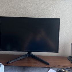 Bose speaker,funko pops,and a monitor