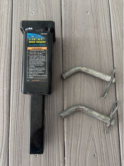 1 1/4” to 2” hitch adapter comes with 2 pins