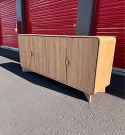 Brand new credenza with gold accent handles