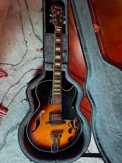 Ibanez Artcore AG75 hollow-body electric guitar.