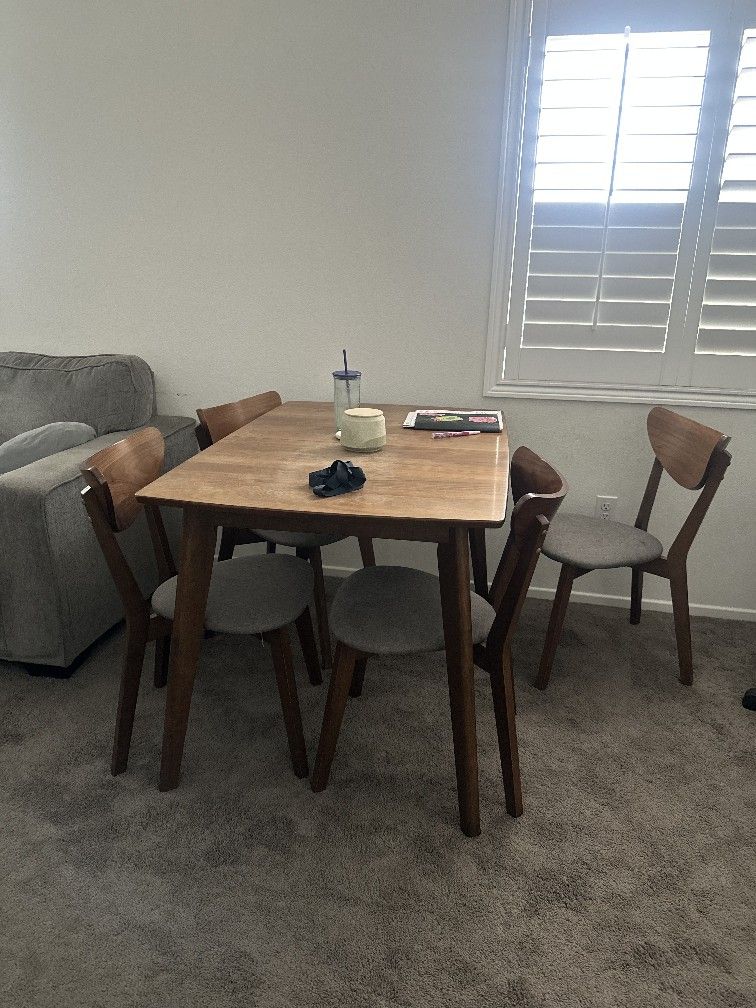 Four Chairs And Dining Table